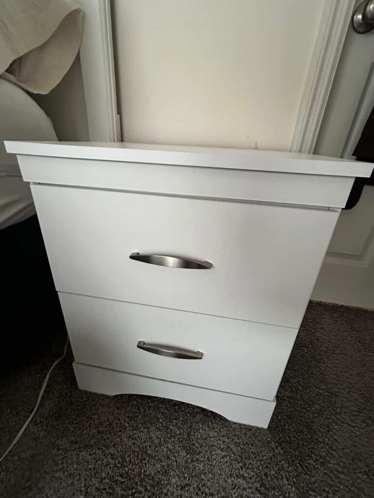 Bedroom Set Featuring bed, nightstand, and chest of drawers excluding linens and lamp