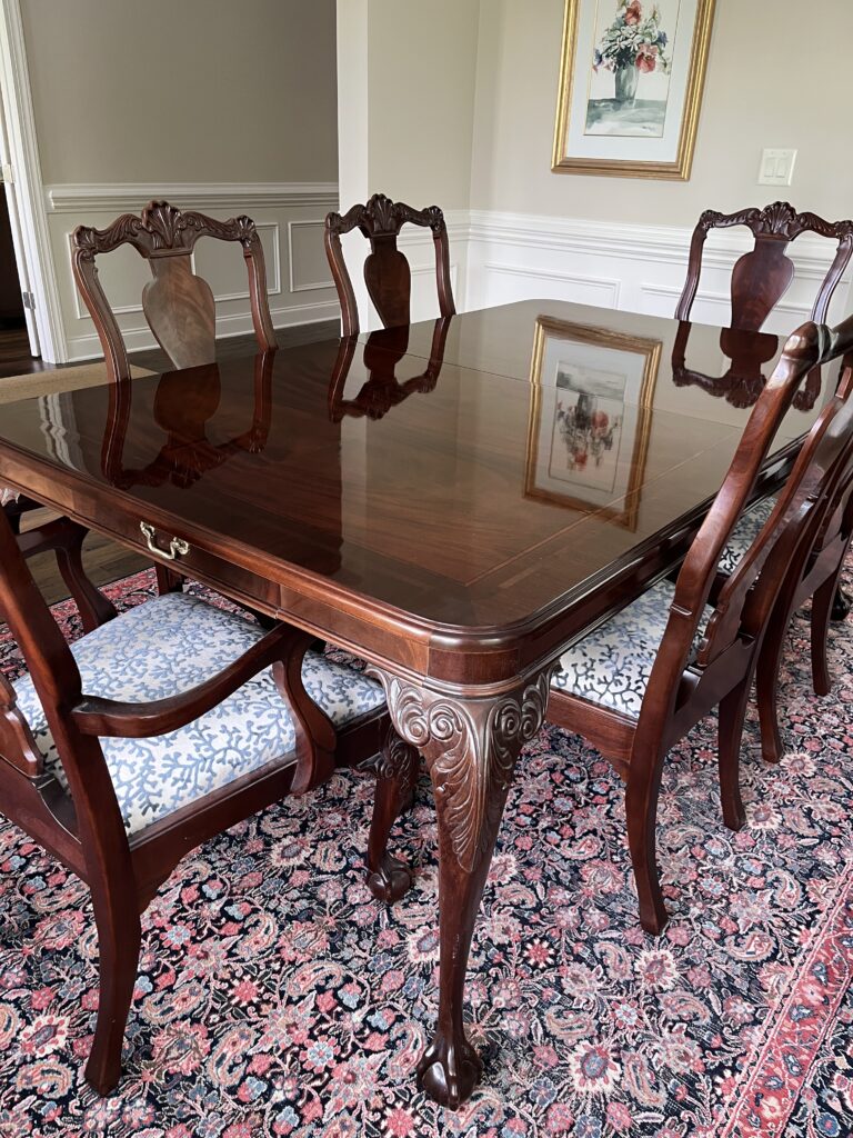 Dining table and Chairs: Bernhardt Centennial Georgian Chippendale collection mahogany table and 8 chairs.