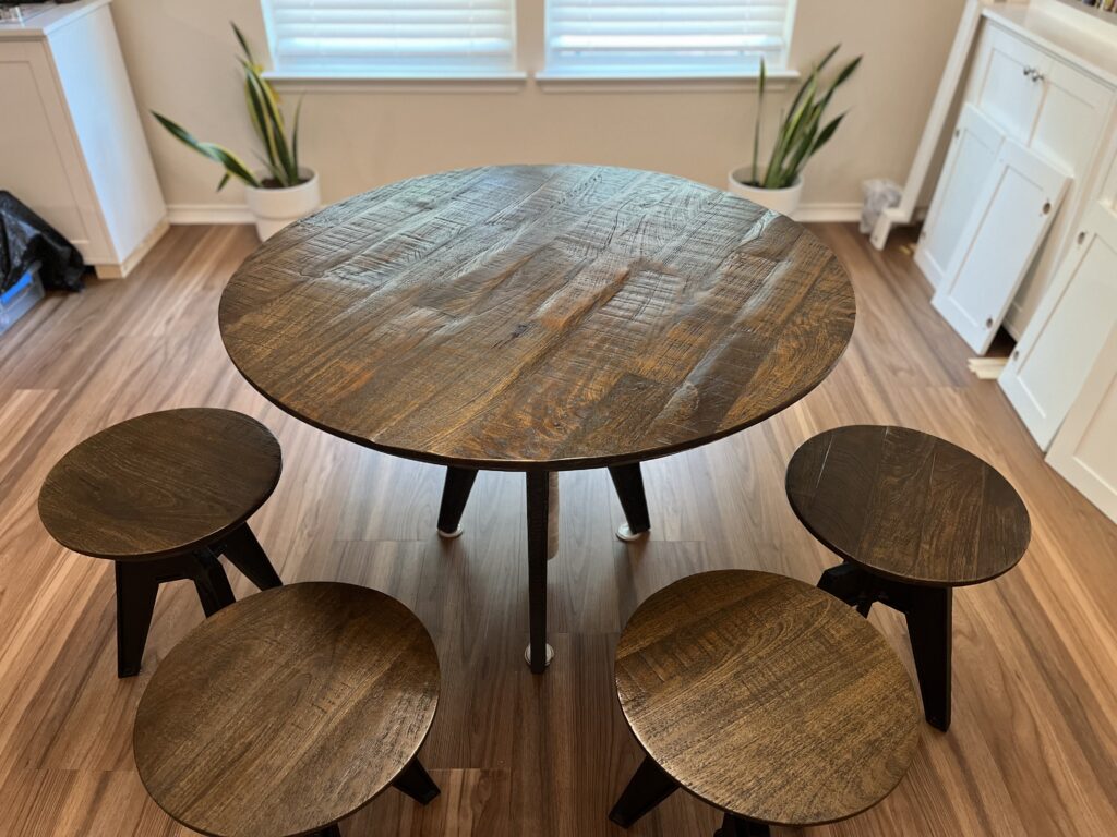 World Interiors solid wood adjustable height industrial modern bar table and 4 stools