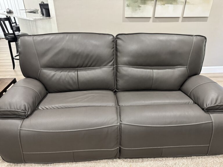 Gray leather couch with 2 recliners
